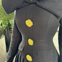 Buttoned Dress With Large Decorative Gold Buttons And Neckline Bow - Black